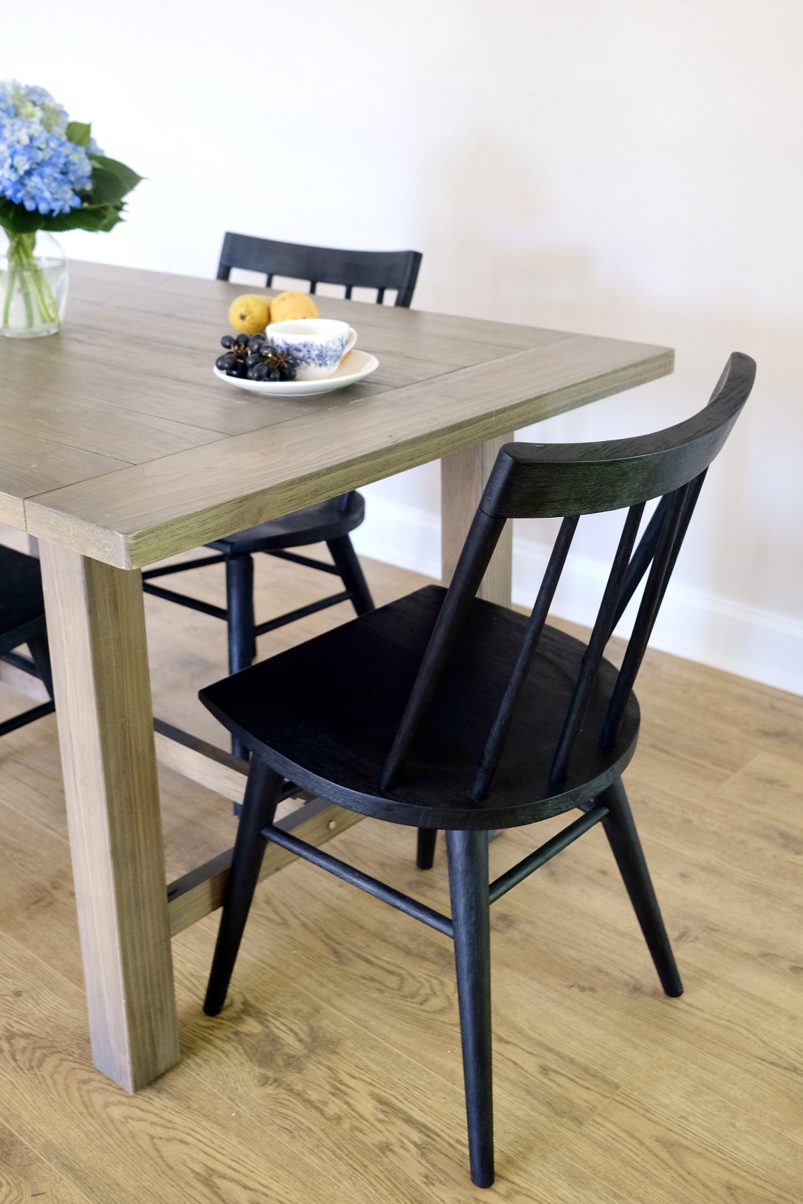 Lifestyle Blogger Chocolate and Lace shares her farmhouse style dining table and chairs